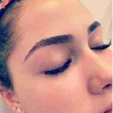 Maintaining eyebrows with waxing