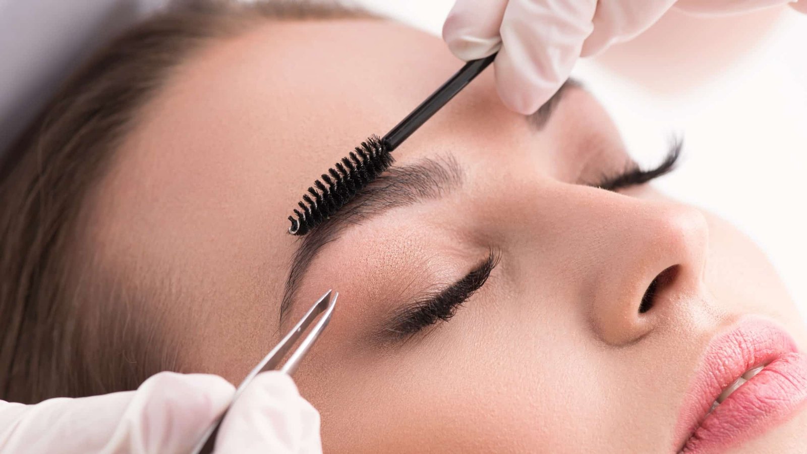 brow waxing threading and tweezing to shape brows