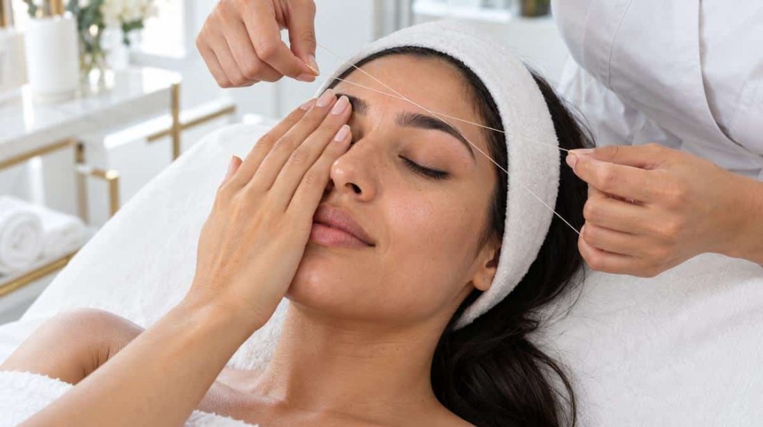 Client relaxing during eyebrow threading