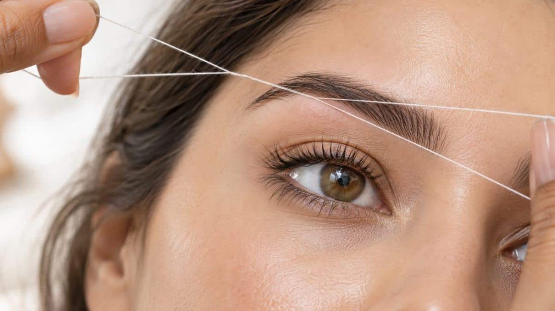 Threading thread across the brow, eye open